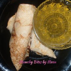 A picture of Meen's Pancake Rolls with Natural Orange Syrup.