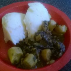 A picture of Spinach with sweet potatoes.