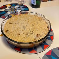 A picture of Apple and raisin crumble - comfort food.