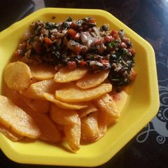 Chips and veggie-egg sauce A picture of Chips and veggie-egg sauce.