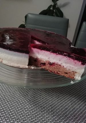 O poză a rețetei Cheesecake cu blat și afine.