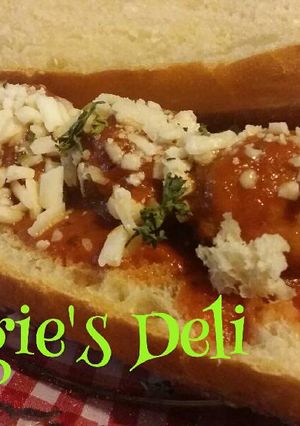 A picture of Meatball Sandwich with Bolognese Sauce.