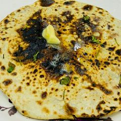 A picture of Tawa Amritsari Aloo kulcha.
