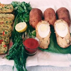A picture of Egg roll and Egg kabab.