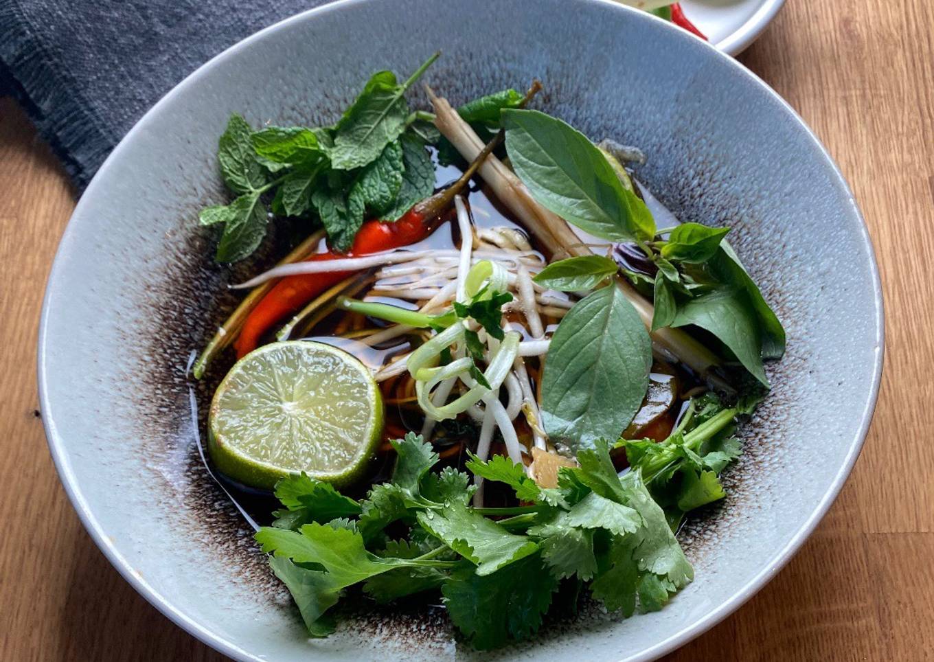 Tom Yum seasonal vegetable soup with herbs