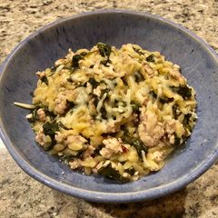 A picture of Creamy Orzo with turkey and spinach.