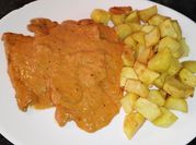 Una foto de filetes de lomo en salsa