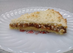 Una foto de Tarta de Coco y arequipe o dulce de leche