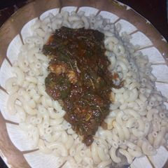A picture of Macaroni with Spinach Soup.