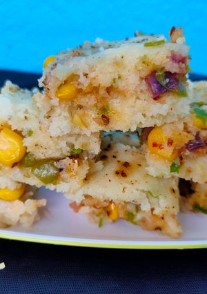 A picture of Cheese corn dhokla.