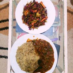 A picture of Lentil Mukimo,liver stew and mixed vegetables salad.