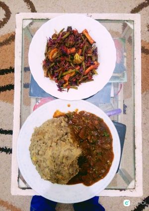 A picture of Lentil Mukimo,liver stew and mixed vegetables salad.