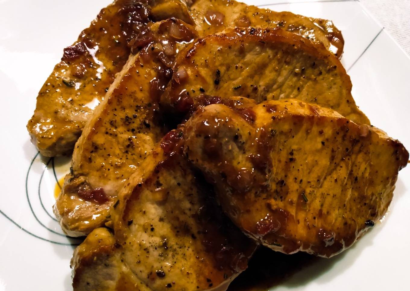 Pork chops with lingonberry and rosemary pan sauce