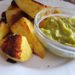 A picture of Pan fried arrow roots and avocado dip.