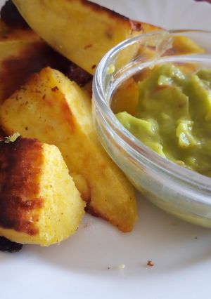 A picture of Pan fried arrow roots and avocado dip.