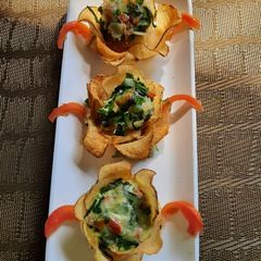 A picture of Cheesy Vegetables Potato Cup.