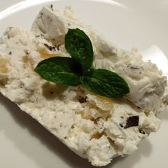 A picture of Pina colada meringue gelato cake.