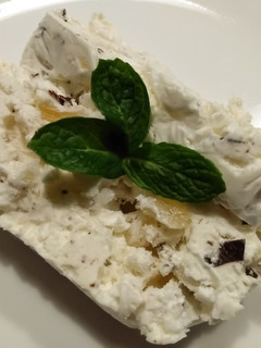 A picture of Pina colada meringue gelato cake.