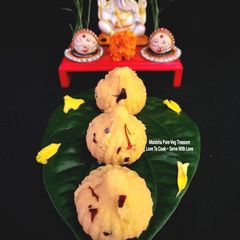 A picture of Shahi Kesariya Coconut Mawa Modak.