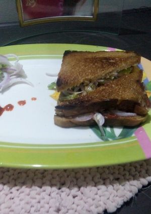 A picture of Schezwan Dahi Sandwich.