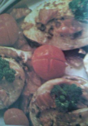 Una foto de Rodajas de cazón al horno con salsa de champiñones