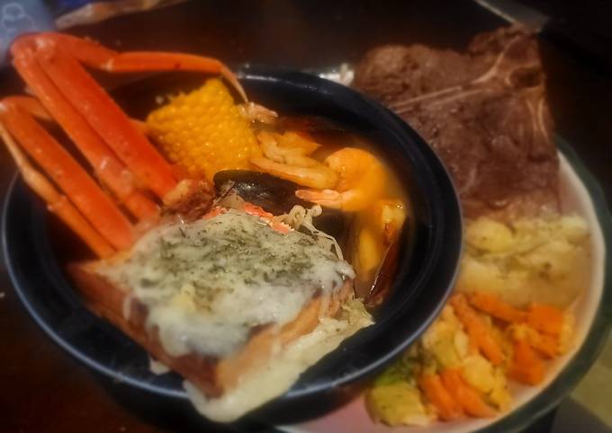 Home-cooked Surf-n-Turf (seafood and steak w/sides)