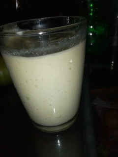 A picture of Banana, avocado and orange smoothie.