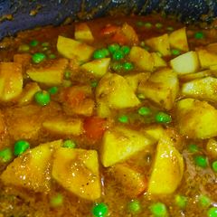 Potatoes Peas & Tomato Curry A picture of Potatoes Peas & Tomato Curry.