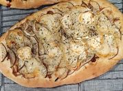 Una foto de queso brie oregano