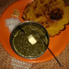 A picture of Makke ka paratha sarso ka saag.