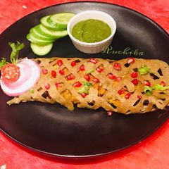 A picture of Moong Daal and Red Rice Dosa.