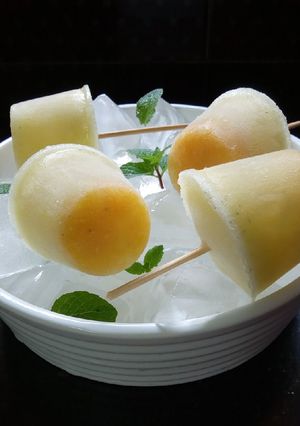 A picture of Pineapple,mint,passion fruit lollies#recipemarathon.