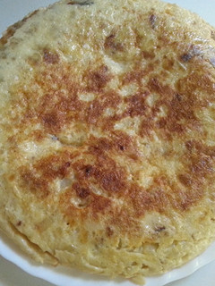 Una foto de Tortilla de patatas con cebolla
