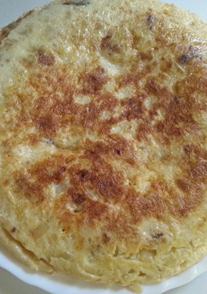 Una foto de Tortilla de patatas con cebolla
