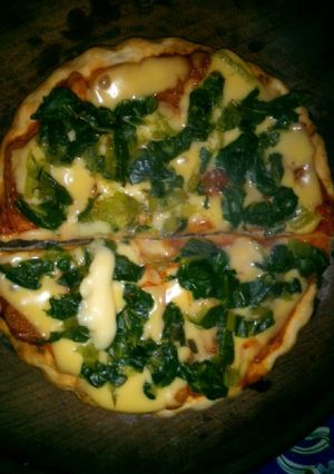 Una foto de Pizza casera de acelga