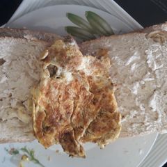 A picture of Bread and fried eggs.