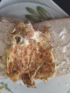 A picture of Bread and fried eggs.