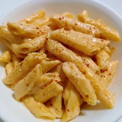 A picture of Pasta and cheese.