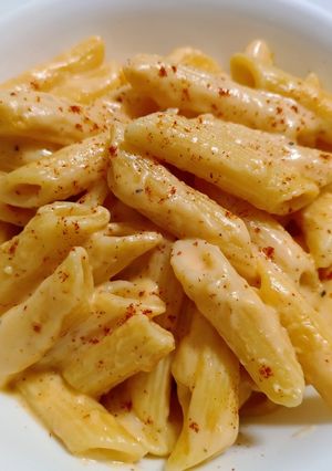 A picture of Pasta and cheese.