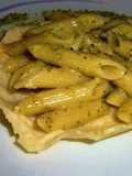 Penne with Gorgonzola and Genovese Pesto served in a Parmesan Basket