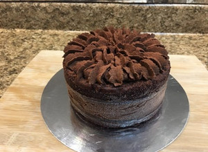 Una foto de Mini pastel de chocolate con ganache de chocolate