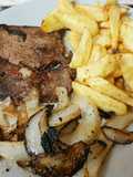 My Well done Peppered Ribeye Steak with onions