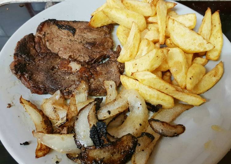 My Well done Peppered Ribeye Steak with onions