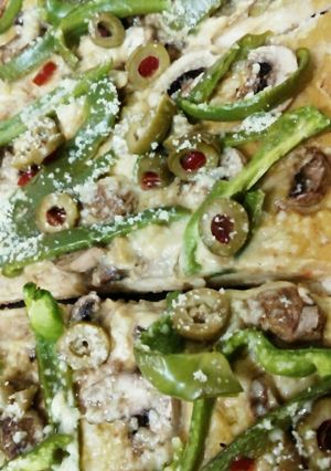 Una foto de Pizza Vegetariana con Hummus