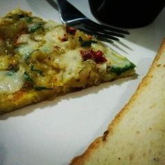 A picture of Potato Cheese Omelette😋🍕🍳.