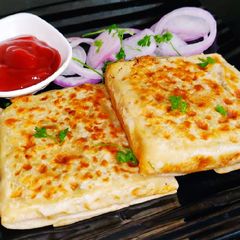 A picture of Mutabak | Egg Chicken Filling.