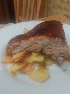 Una foto de Cochinillo asado