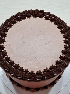 Una foto de Ganache de chocolate y Dulce de leche para relleno y cobertura