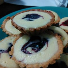 A picture of Blueberry Cheese Tarts.