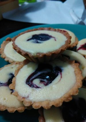 A picture of Blueberry Cheese Tarts.